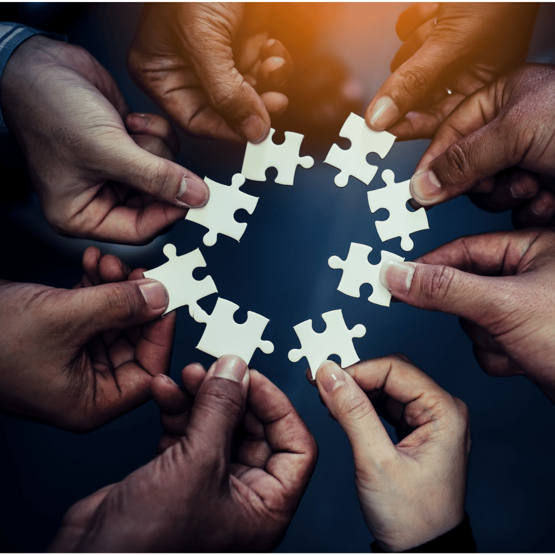 A group of people connecting the puzzle. About Health & Safety Professionals Inc.- About HSPI